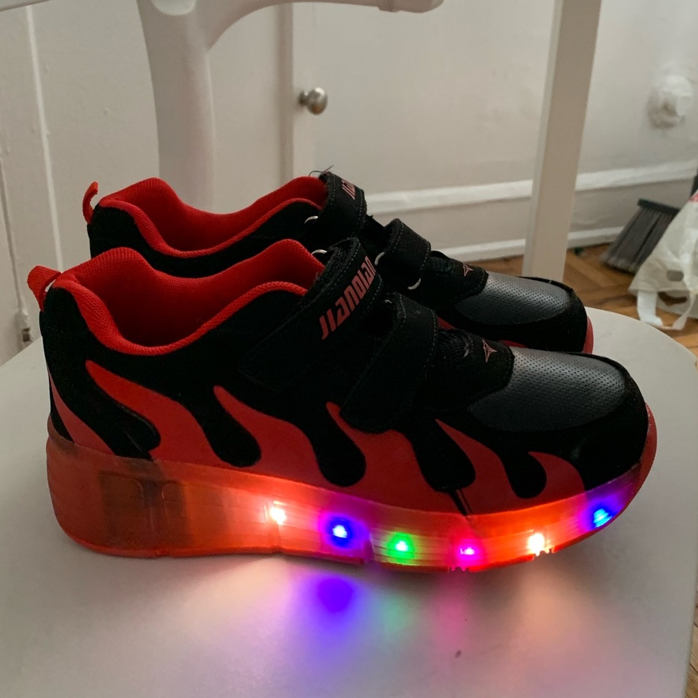 Flame sneakers with heelys wheels